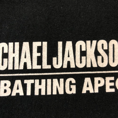 【中古品】【メンズ】 A BATHING APE アベイシングエイプ × MICHAEL JACKSON マイケル・ジャクソン 別注 コラボ 23AW S/S GRAPHIC TEE ショートスリーブ グラフィック Tシャツ 半袖 トップス 142-250313-kk-09-tei サイズ：XL カラー：ブラック 万代Net店