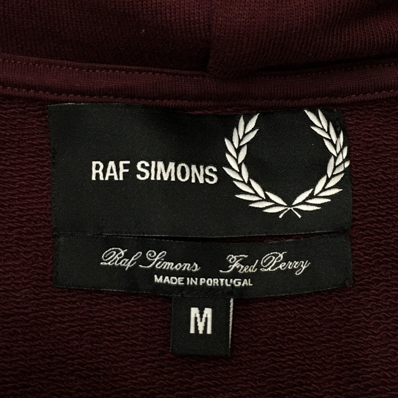 【中古品】【メンズ】 FRED PERRY フレッドペリー × RAF SIMONS ラフシモンズ 別注 コラボ 23SS DRAWSTRING PULLOVER HOODIE SM4214 ドローストリング プルオーバー フーディー トップス パーカー 141-250504-kk-06-tei サイズ：M カラー：ボルドー 万代Net店