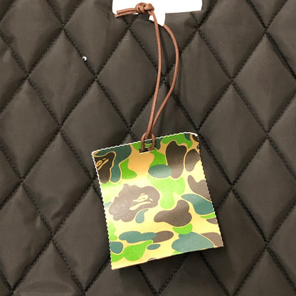 【中古美品】【メンズ】 A BATHING APE アベイシングエイプ SOLID CAMO NYC LOGO VARSITY BOMBER JACKET 001HJK801005M ソリッドカモ NYC ロゴ バーシティー ボンバージャケット アウター ナイロンスタジャン 142-250530-kk-29-fuz サイズ：L カラー：ネイビー 万代Net店