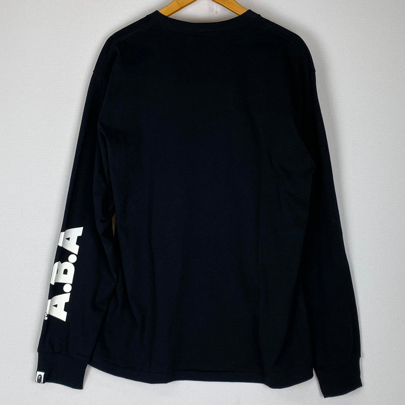 【中古品】【メンズ】 A BATHING APE アベイシングエイプ × UNDEFEATED アンディフィーテッド 別注 コラボ L/S COTTON TEE ロングスリーブ コットン Tシャツ 長袖 トップス 142-251208-yy-05-tei サイズ：XL カラー：ブラック 万代Net店