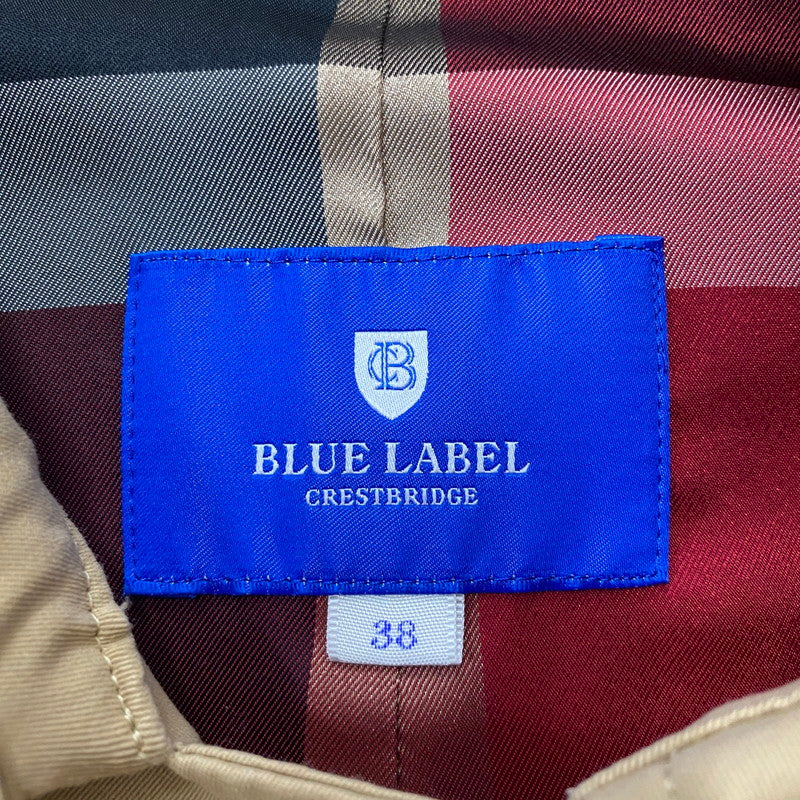 【中古品】【レディース】 BLUE LABEL CRESTBRIDGE ブルーレーベル・クレストブリッジ SHORT TRENCH COAT 55F24-735-40 ショートトレンチコート ライトアウター 168-260304-ks-24-tei サイズ：38 カラー：ベージュ 万代Net店