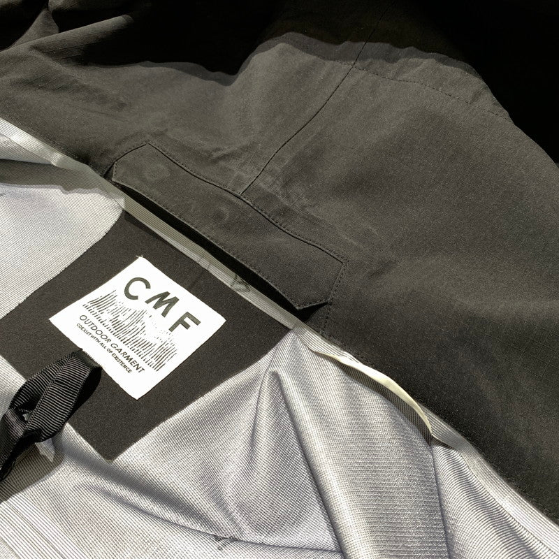 【中古品】【メンズ】 CMF OUTDOOR GARMENT コムフィアウトドアガーメント GUIDE SHELL COEXIST CMF2302-J09C ガイド シェル コエグジスト ジャケット アウター 144-260330-ko-08-tei サイズ：L カラー：ブラック 万代Net店