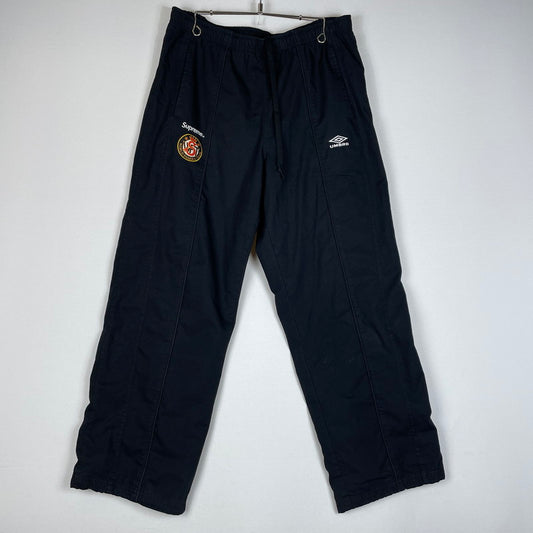 【中古品】【メンズ】 Supreme シュプリーム × UMBRO アンブロ 別注 コラボ COTTON RIPSTOP TRACK PANT コットン リップストップ トラックパンツ ボトムス 149-260502-yo-06-tei サイズ：USAM カラー：ブラック 万代Net店