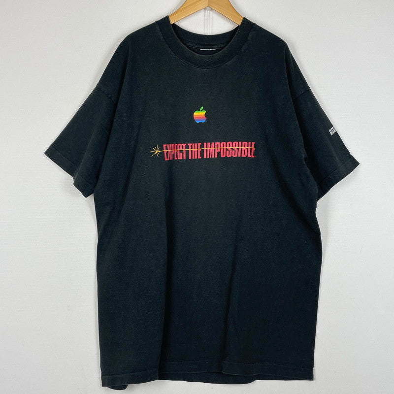 【中古品】【メンズ】 UNKNOWN 90's APPLE アンノウン 90年代 アップル × MISSION IMPOSSIBLE ミッションインポッシブル 別注コラボ EXPECT THE IMPOSSIBLE エクスペクト ザ インポッシブル 半袖 トップス 145-260615-sa-07-tei サイズ：不明 カラー：ブラック 万代Net店