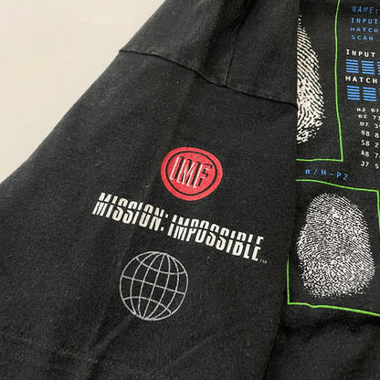 【中古品】【メンズ】 UNKNOWN 90's APPLE アンノウン 90年代 アップル × MISSION IMPOSSIBLE ミッションインポッシブル 別注コラボ EXPECT THE IMPOSSIBLE エクスペクト ザ インポッシブル 半袖 トップス 145-260615-sa-07-tei サイズ：不明 カラー：ブラック 万代Net店