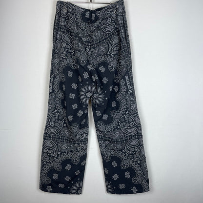 【中古品】【メンズ】 SUPREME シュプリーム 26SS REFLECTIVE BANDANA TRACK PANT 20026年春夏 リフレクティブ バンダナ トラック パンツ ボトムス 149-260811-sa-14-tei サイズ：L カラー：ブラック 万代Net店