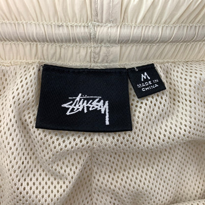 【中古品】【メンズ】 STUSSY ステューシー NYLON TRACK PANT 116746 ナイロン トラックパンツ ボトムス イージーパンツ 153-260905-ko-01-teih サイズ：M カラー：ホワイト系/アイボリー系 万代Net店