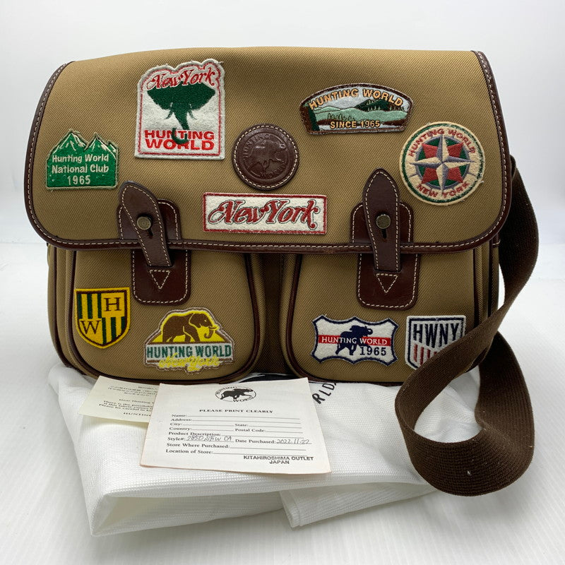 【中古品】【メンズ】 HUNTING WORLD ハンティングワールド サファリ ワッペン ショルダーバッグ カバン メッセンジャーバッグ 188-260914-ko-09-teih カラー：ブラウン系 万代Net店