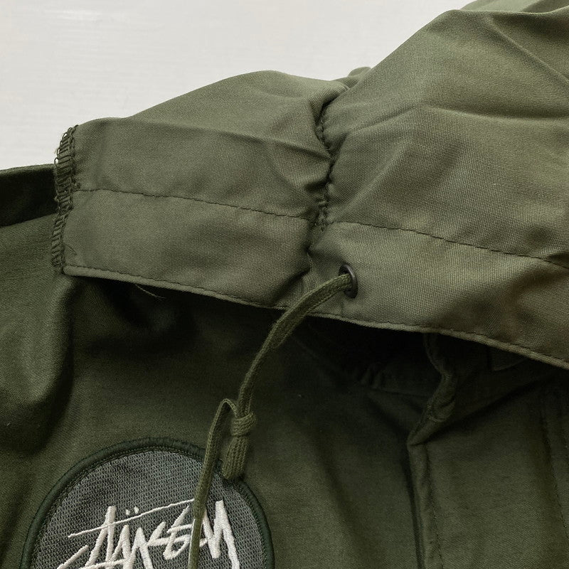 【中古品】【メンズ】 STUSSY ステューシー × ALPHA INDUSTRIES アルファ インダスト 別注コラボ MILITARY JACKET M-65 ミリタリー ジャケット アウター 145-260922-sa-05-teih サイズ：L-R カラー：グリーン 万代Net店