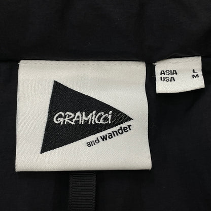 【中古品】【メンズ】 AND WANDER アンドワンダー × GRAMICCI グラミチ 別注コラボ DOWN VEST GUJ4-F3001-M ダウン ベスト アウター 144-261015-sa-03-teih サイズ：L カラー：ブラック 万代Net店