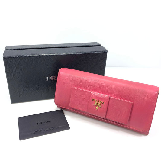 【現状渡し品】【レディース】 PRADA プラダ サフィアーノ リボン付き二つ折り長財布 1M1132 ロングウォレット 財布 181-250619-rt-07-tag カラー：ピオニア 万代Net店