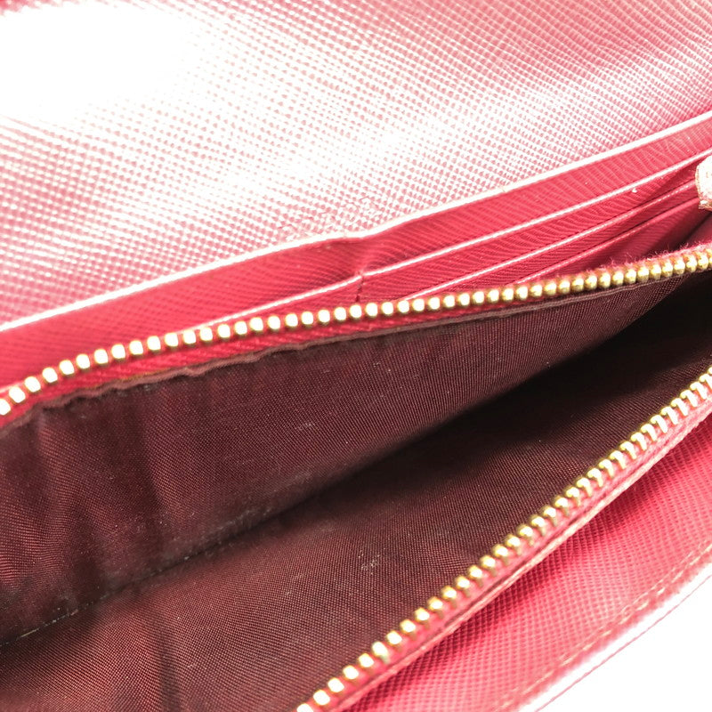 【現状渡し品】【レディース】 PRADA プラダ サフィアーノ リボン付き二つ折り長財布 1M1132 ロングウォレット 財布 181-250619-rt-07-tag カラー：ピオニア 万代Net店