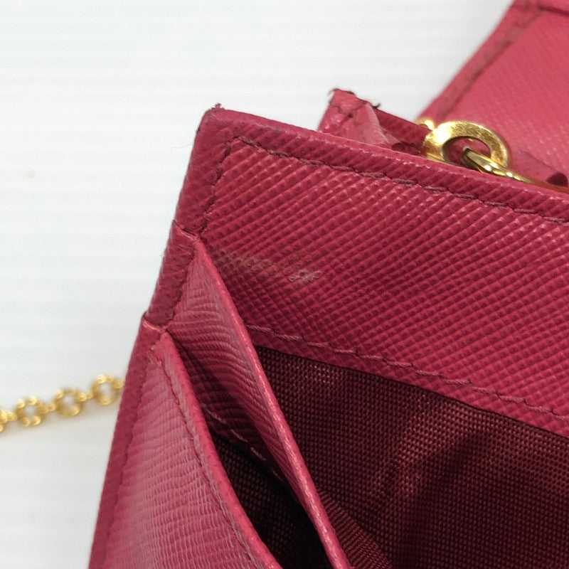 【現状渡し品】【レディース】 PRADA プラダ サフィアーノ リボン付き二つ折り長財布 1M1132 ロングウォレット 財布 181-250619-rt-07-tag カラー：ピオニア 万代Net店