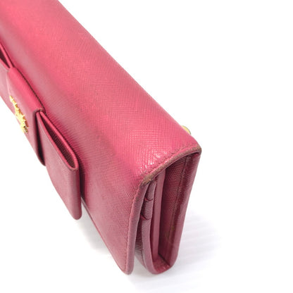 【現状渡し品】【レディース】 PRADA プラダ サフィアーノ リボン付き二つ折り長財布 1M1132 ロングウォレット 財布 181-250619-rt-07-tag カラー：ピオニア 万代Net店