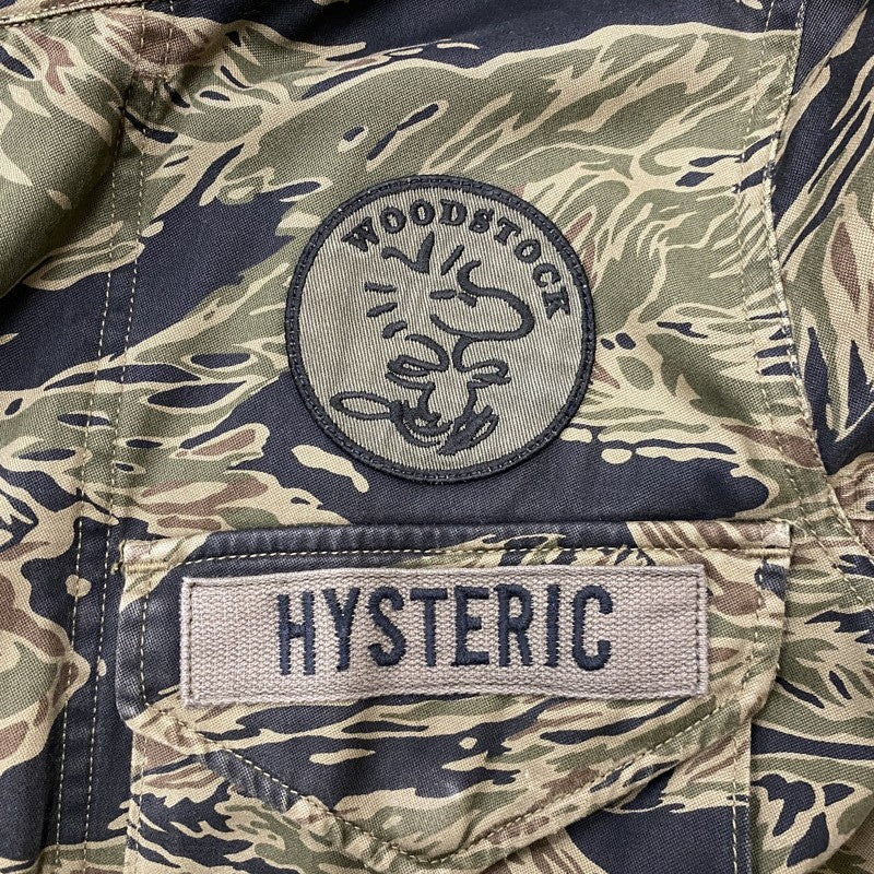 【中古品】【メンズ】 HYSTERIC GLAMOUR ヒステリックグラマー × PEANUTS ピーナッツ × Theater 8 シアターエイト 別注コラボ MILITARY JACKET M-65 0193AB07 ミリタリージャケット アウター 170-260917-ss-10-teih サイズ：フリー カラー：柄 万代Net店