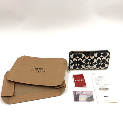 【中古品】【レディース】 COACH コーチ SIGNATURE LONG ZIP AROUND WALLET CP409 シグネチャー ロング ジップ アラウンド ウォレット 長財布 財布 181-261004-hn-09-fur カラー：ブラック/クリーム系 万代Net店