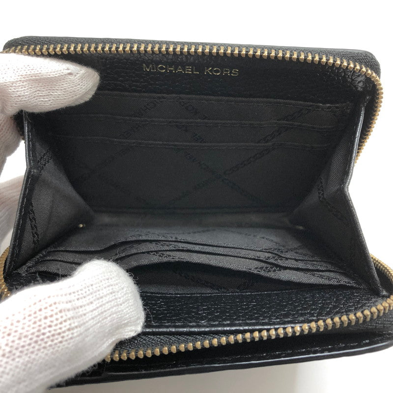 【中古品】【レディース】 MICHAEL KORS マイケルコース ミディアム ジップアラウンド スナップ ウォレット 34F9GJ6Z8L 二つ折り財布 コンパクトウォレット 201-260508-rs-05-fur カラー：ブラック 万代Net店