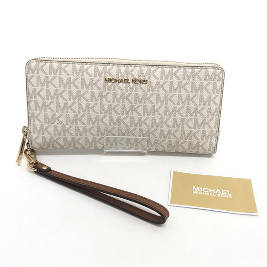 【中古品】【レディース】 MICHAEL KORS マイケルコース 35F8GTVT3B パウダーブラッシュマルチ ジェット セット トラベル シグネチャー ラージ トラベル コンチネンタル ラウンド ジップ 長財布 181-260521-rs-06-fur カラー：バニラ 万代Net店
