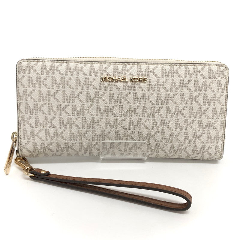 【中古品】【レディース】 MICHAEL KORS マイケルコース 35F8GTVT3B パウダーブラッシュマルチ ジェット セット トラベル シグネチャー ラージ トラベル コンチネンタル ラウンド ジップ 長財布 181-260521-rs-06-fur カラー：バニラ 万代Net店