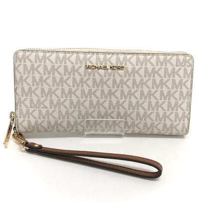 【中古品】【レディース】 MICHAEL KORS マイケルコース 35F8GTVT3B パウダーブラッシュマルチ ジェット セット トラベル シグネチャー ラージ トラベル コンチネンタル ラウンド ジップ 長財布 181-260521-rs-06-fur カラー：バニラ 万代Net店