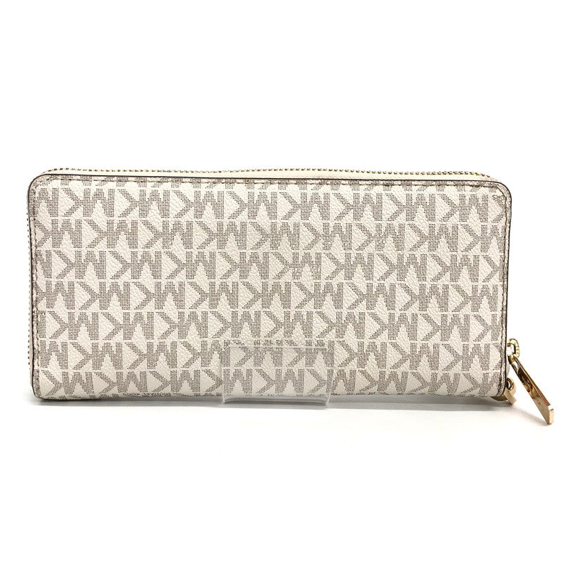 【中古品】【レディース】 MICHAEL KORS マイケルコース 35F8GTVT3B パウダーブラッシュマルチ ジェット セット トラベル シグネチャー ラージ トラベル コンチネンタル ラウンド ジップ 長財布 181-260521-rs-06-fur カラー：バニラ 万代Net店