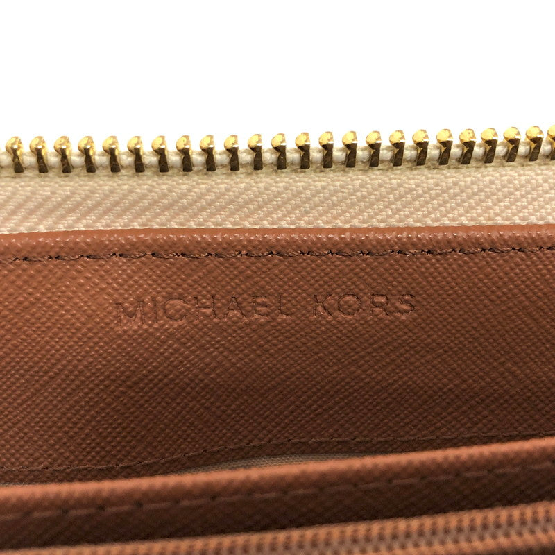【中古品】【レディース】 MICHAEL KORS マイケルコース 35F8GTVT3B パウダーブラッシュマルチ ジェット セット トラベル シグネチャー ラージ トラベル コンチネンタル ラウンド ジップ 長財布 181-260521-rs-06-fur カラー：バニラ 万代Net店