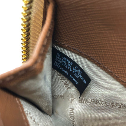 【中古品】【レディース】 MICHAEL KORS マイケルコース 35F8GTVT3B パウダーブラッシュマルチ ジェット セット トラベル シグネチャー ラージ トラベル コンチネンタル ラウンド ジップ 長財布 181-260521-rs-06-fur カラー：バニラ 万代Net店