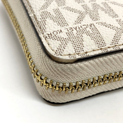 【中古品】【レディース】 MICHAEL KORS マイケルコース 35F8GTVT3B パウダーブラッシュマルチ ジェット セット トラベル シグネチャー ラージ トラベル コンチネンタル ラウンド ジップ 長財布 181-260521-rs-06-fur カラー：バニラ 万代Net店