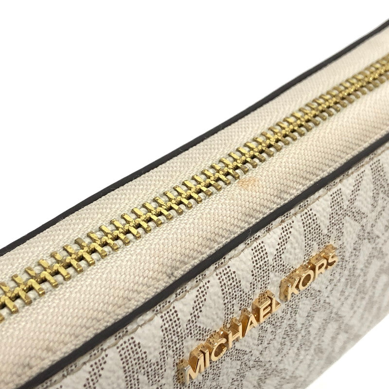 【中古品】【レディース】 MICHAEL KORS マイケルコース 35F8GTVT3B パウダーブラッシュマルチ ジェット セット トラベル シグネチャー ラージ トラベル コンチネンタル ラウンド ジップ 長財布 181-260521-rs-06-fur カラー：バニラ 万代Net店