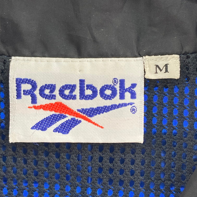 【中古品】【メンズ】 Reebok リーボック ナイロンジャケット 148-260121-WA-08-iwa サイズ：M カラー：ブルー ブラック 万代Net店