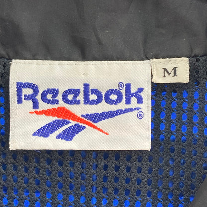 【中古品】【メンズ】 Reebok リーボック ナイロンジャケット 148-260121-WA-08-iwa サイズ：M カラー：ブルー ブラック 万代Net店
